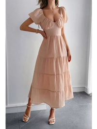 Solid Backless Tiered Puff Sleeve Fit Midi Dress in soft pink with charming puff sleeves and tiered skirt.