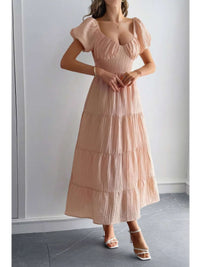 Solid Backless Tiered Puff Sleeve Fit Midi Dress in soft pink with tiered skirt and puff sleeves.