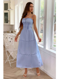 Solid Button Decor Pintuck Eyelet Shirred Dress worn by a model in a bright kitchen setting.