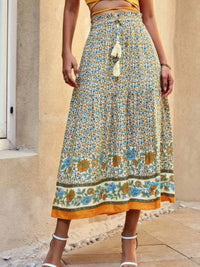 Drawstring Floral Ruffled Maxi Skirt featuring vibrant floral patterns and a stylish ruffled design.