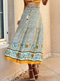 Drawstring Floral Ruffled Maxi Skirt featuring vibrant floral patterns and adjustable drawstring for a customizable fit.