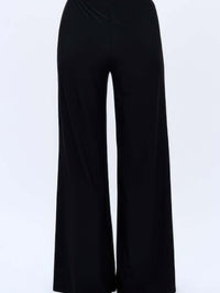 Back view of Hit Palazzo Pants in black, showcasing the wide leg and elastic waistband design.
