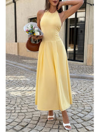 The Daphne Halter Midi – yellow halter dropped hem midi dress, view 2