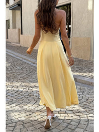 The Daphne Halter Midi – yellow halter dropped hem midi dress, view 3
