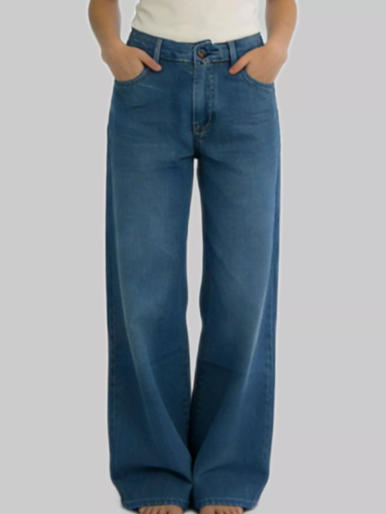 Wide Leg Washed Jeans featuring a classic pocketed design and a relaxed fit.