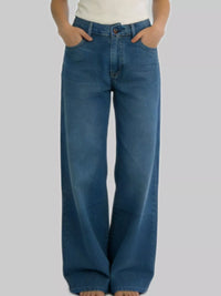 Wide Leg Washed Jeans featuring a classic pocketed design and a relaxed fit.