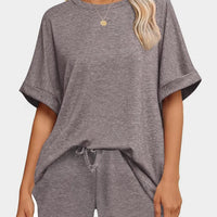 Round Neck T-Shirt and Drawstring Shorts Set modeled in gray with a relaxed fit and drawstring detail.