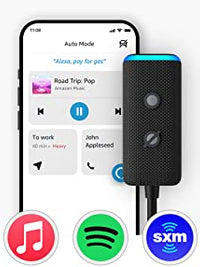 Amazon Echo Auto with smartphone in Auto Mode, showcasing music streaming options including Amazon Music, Spotify, and more.