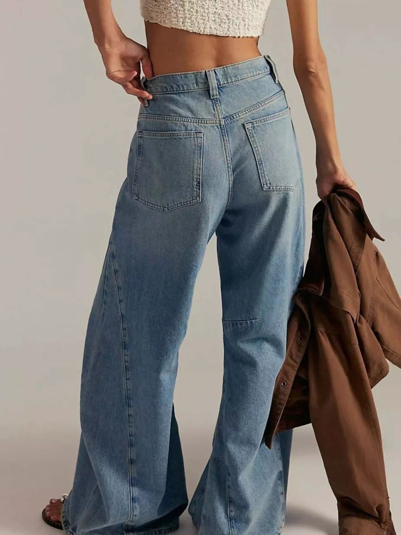 Washed Wide Leg Jeans showcasing a relaxed fit and a back view, perfect for casual styling.