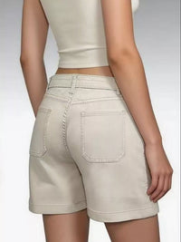 Pocketed Denim Shorts shown from the back, highlighting the pocket design and relaxed fit.