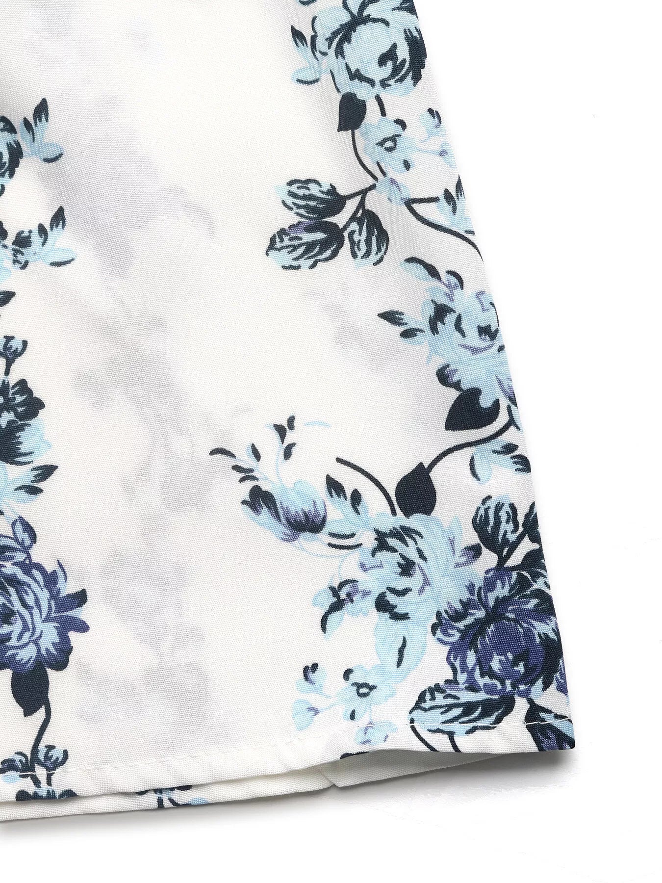 Floral Print Tie Front Wide Leg Pants close-up of floral design in shades of blue on fabric.