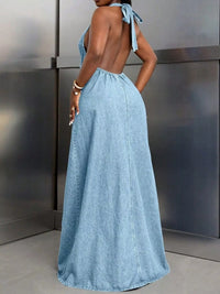 Backless Halter Neck Maxi Denim Dress showcasing a stylish open back and tied halter neckline in light denim.