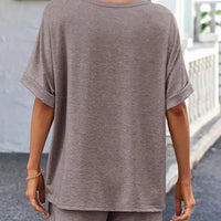 Back view of a model wearing a Round Neck T-Shirt and Drawstring Shorts Set in a stylish setting.