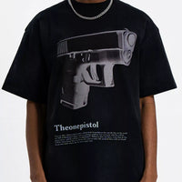 Men's Graphic Round Neck Oversized T-Shirt featuring gun print design, oversized fit, and black color.