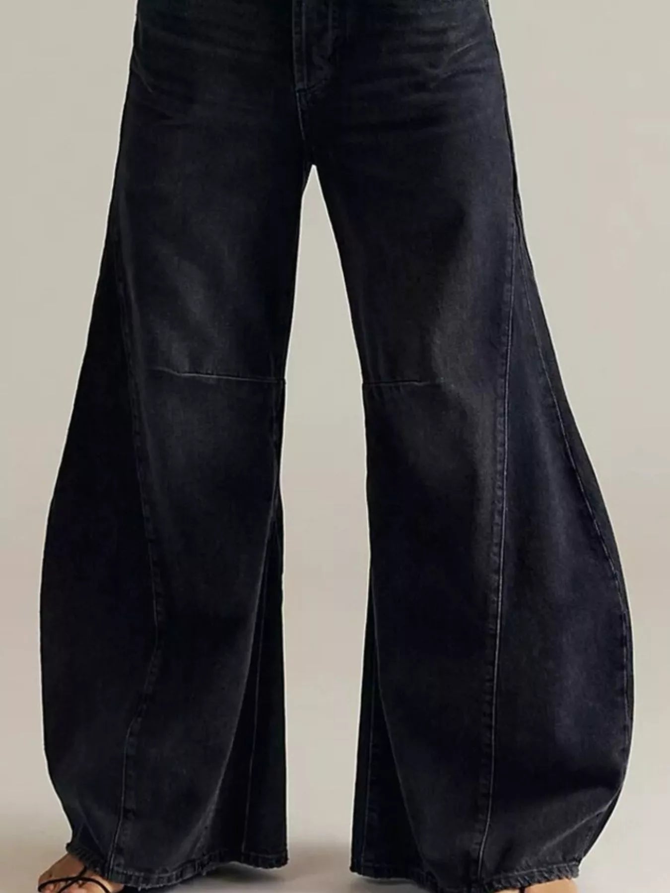 Washed Wide Leg Jeans with a stylish, relaxed fit and a deep black color, perfect for casual outfits.