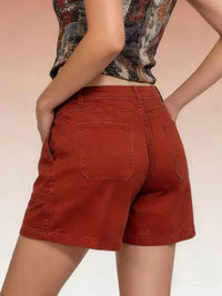 Pocketed Denim Shorts in rust color, featuring a classic pocketed design and stylish back view.