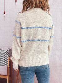 Ribbed Hem Flower Long Sleeve Sweater featuring a cozy beige material with blue stripes on the back.