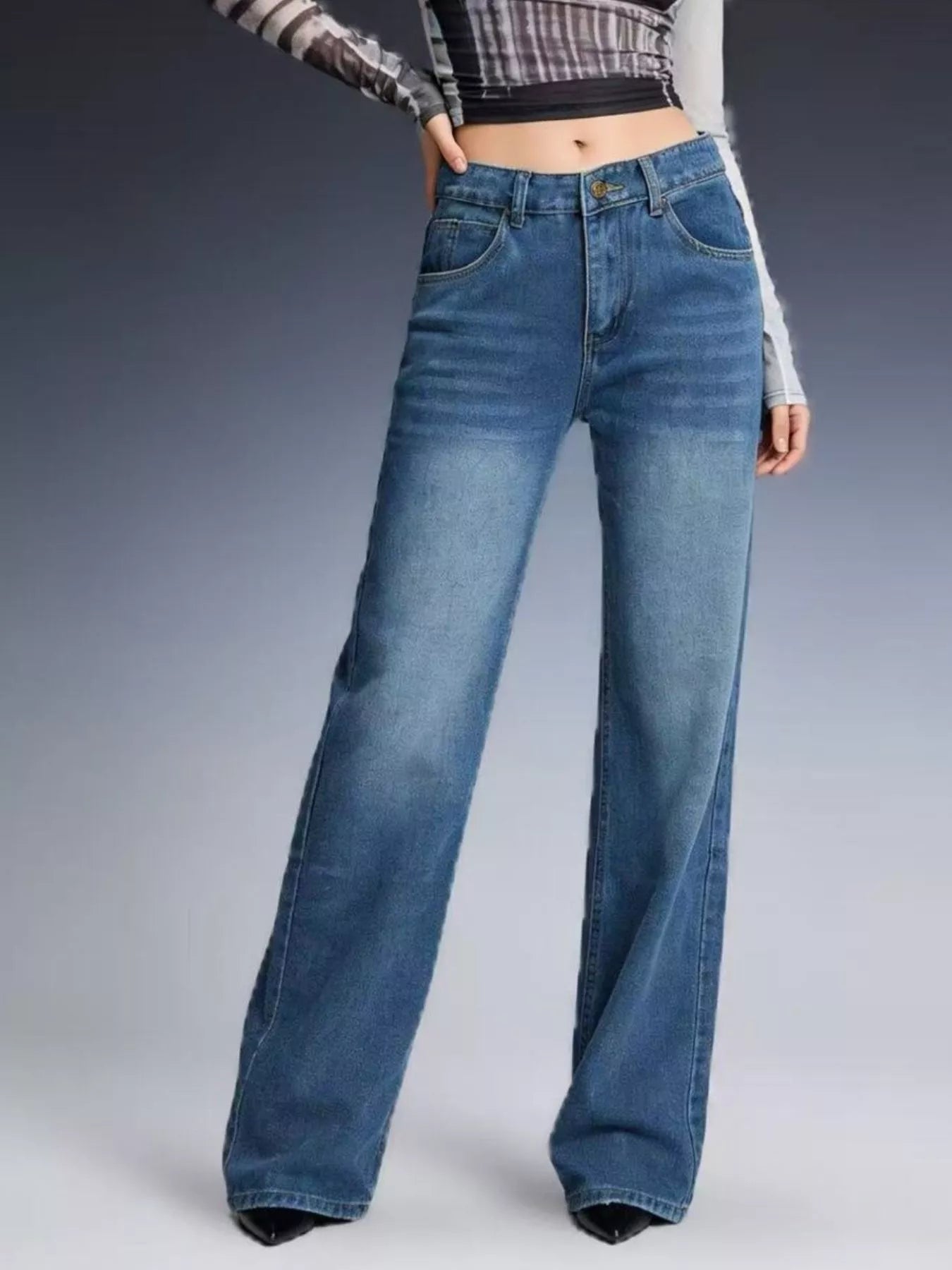 Vintage Wash Wide Leg Jeans displayed on a model showcasing a stylish outfit with denim.