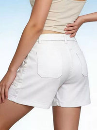 Woman wearing Pocketed Denim Shorts showcasing the back design and pockets, perfect for casual summer outfits.
