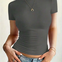 Round Neck Short Sleeve T-Shirt in gray, featuring a fitted design, worn casually with jeans and accessorized with jewelry.