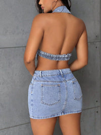 Backless Sleeveless Button Front Denim Mini Dress showcased from the back with a stylish design and pockets.