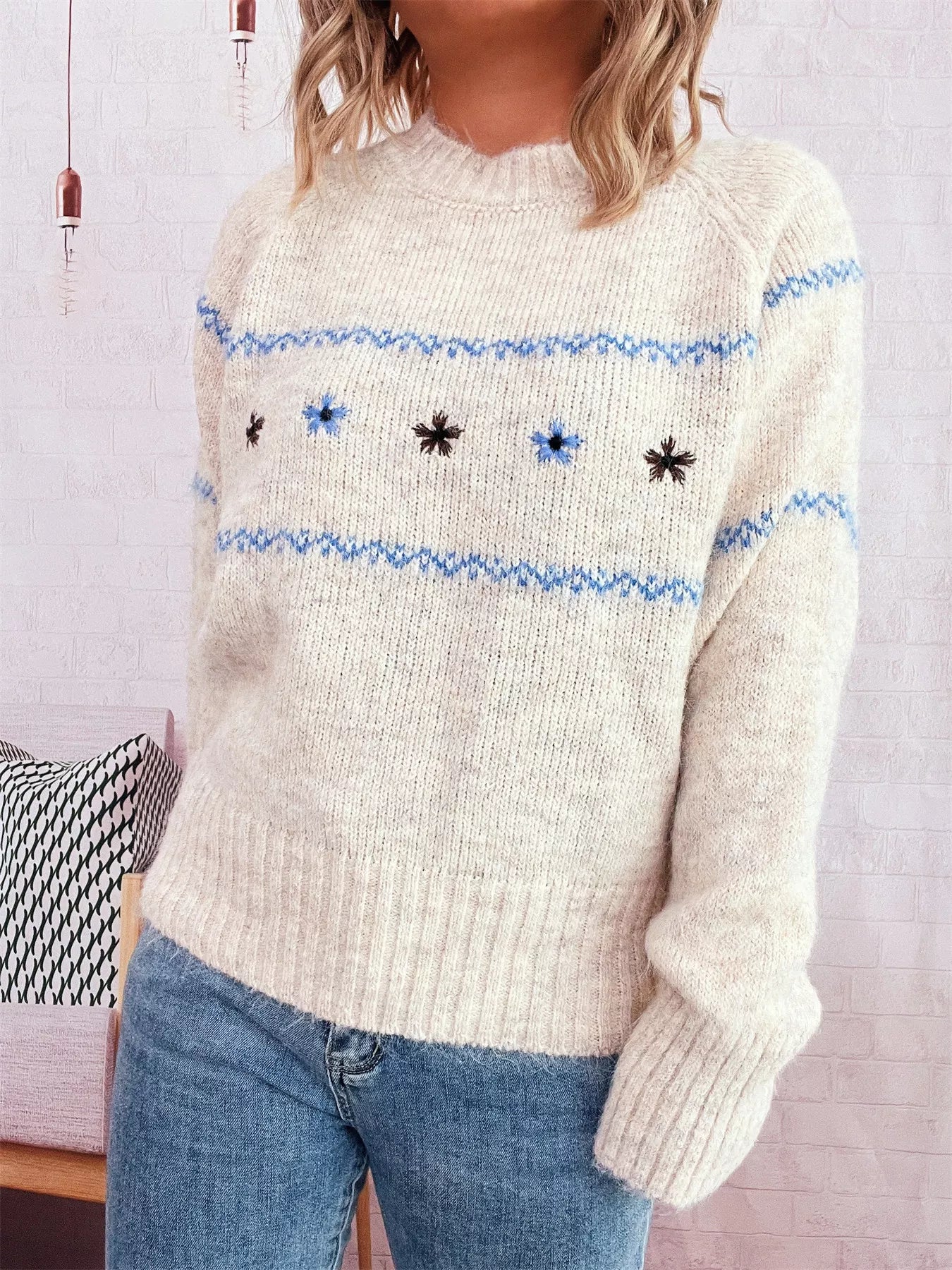 Ribbed Hem Flower Long Sleeve Sweater featuring delicate flower detailing and a snug fit.