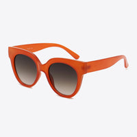 UV400 Polycarbonate Round Sunglasses with orange frame and gradient lenses.