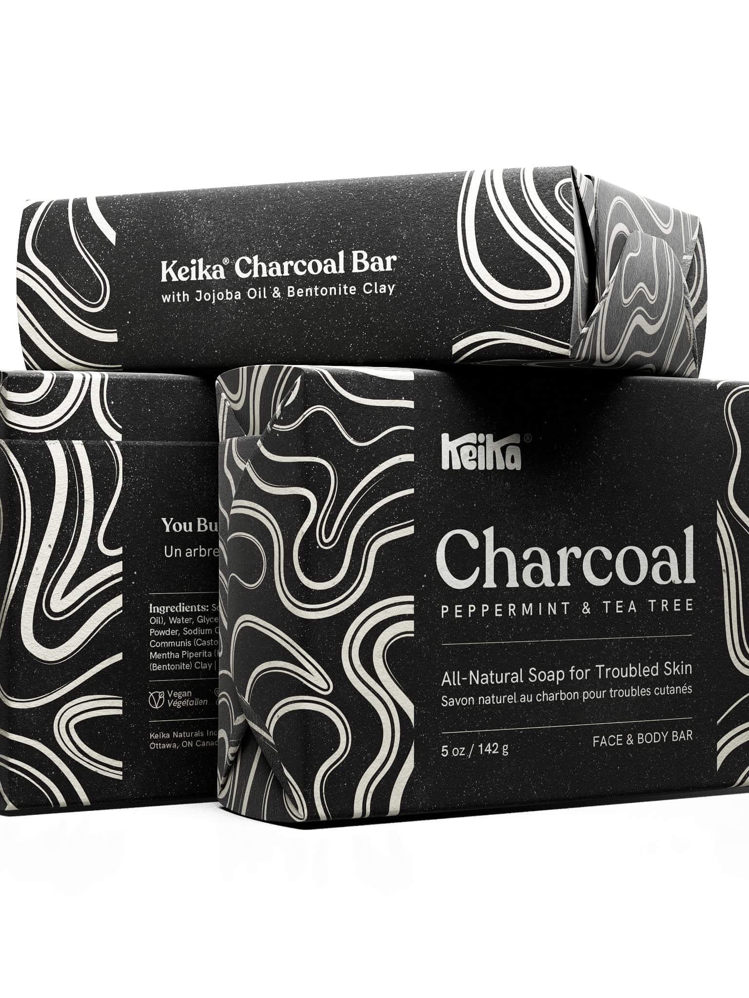 Keika Charcoal Soap Bar packaging, all-natural soap for troubled skin with jojoba oil and bentonite clay, 5 oz.