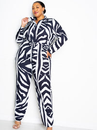 Button Up Long Sleeve Jumpsuit in stylish zebra print, perfect for a chic and sophisticated look.