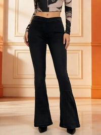High-Waisted Flare Jeans in black featuring a fitted silhouette and flared hem for a stylish look.