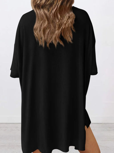 Full Size Oversized Slit Round Neck Top and Shorts Lounge Set Plus Size shown from the back in black.