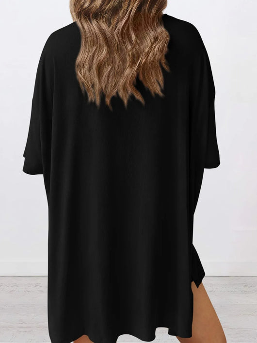 Full Size Oversized Slit Round Neck Top and Shorts Lounge Set Plus Size shown from the back in black.