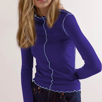 Basic Bae Contrast Trim Mock Neck Long Sleeve T-Shirt in vibrant purple with contrast trim details, styled casually.