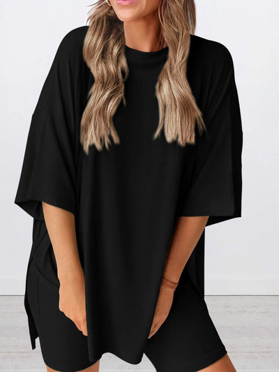 Full Size Oversized Slit Round Neck Top and Shorts Lounge Set Plus Size in black worn by model.