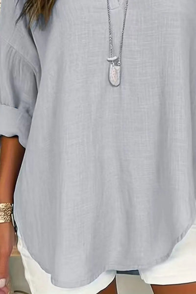 Solid Color Notched Long Sleeve Blouse in light gray with a round hem and layered necklace.