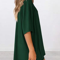 Full Size Oversized Slit Round Neck Top and Shorts Lounge Set Plus Size in green, featuring a relaxed fit and side slit.