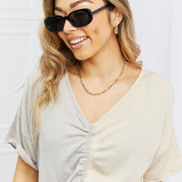 Oval Full Rim Sunglasses showcased on a model wearing a casual outfit and smiling.