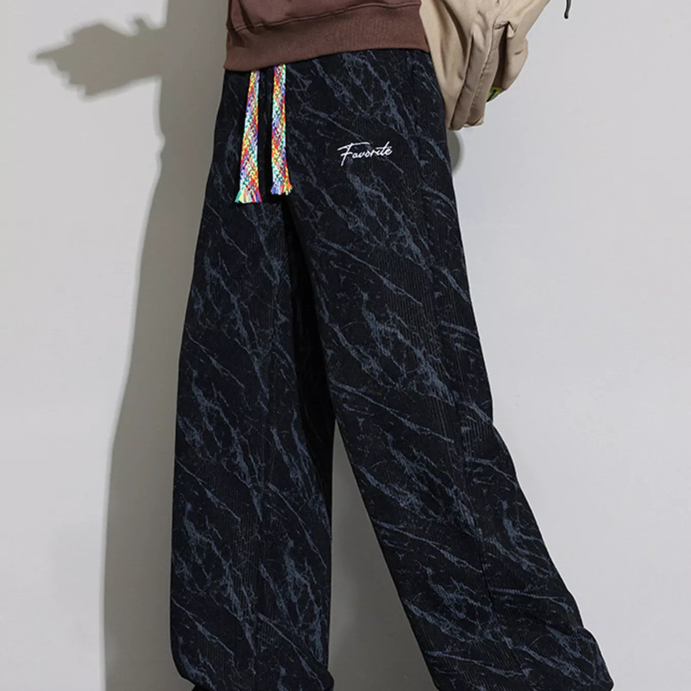 Men's Wide Leg Casual Pants with drawstring in stylish black marble pattern, perfect for casual wear.