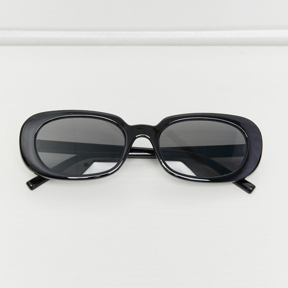 Oval Full Rim Sunglasses displayed on a white surface with UV protection.