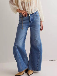 Washed Wide Leg Jeans featuring a relaxed fit and pocketed design, perfect for casual outings.