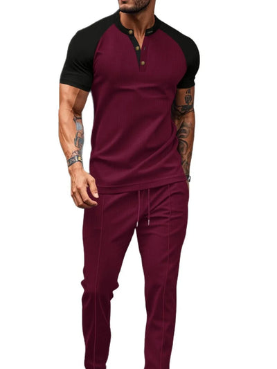 Men's Full Size Waffle-Knit Contrast Top and Drawstring Pants Set Plus Size model wearing burgundy outfit.
