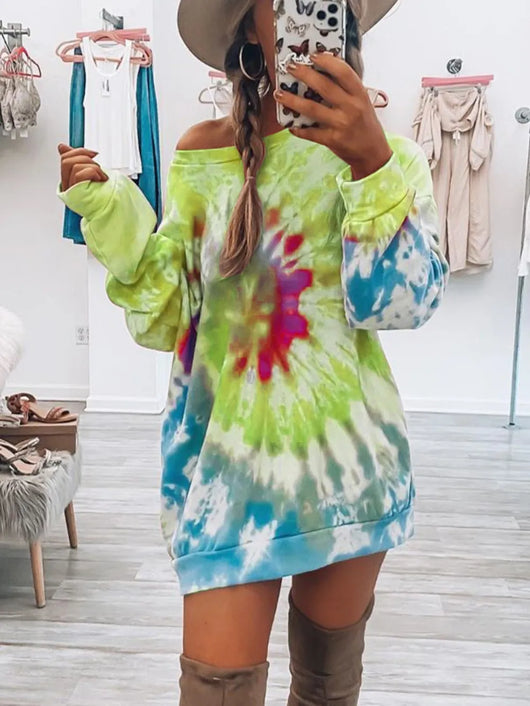 Full Size Tie-Dye Round Neck Long Sleeve Dress worn by a model in vibrant colors showcasing the unique tie-dye pattern.