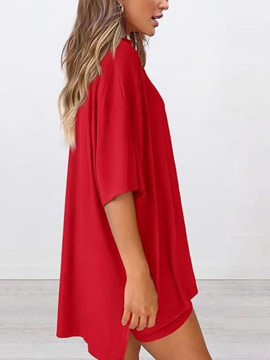 Full Size Oversized Slit Round Neck Top and Shorts Lounge Set Plus Size in red, showcasing the oversized style and relaxed fit.