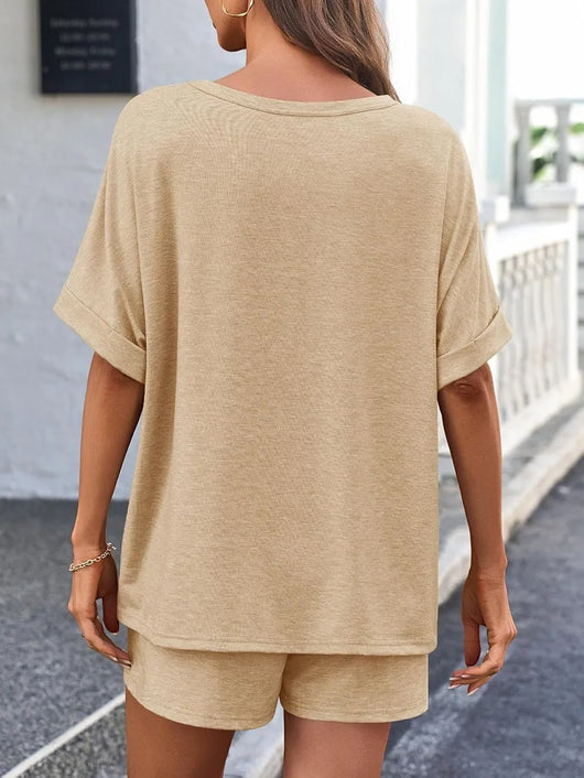 Back view of woman wearing a Round Neck T-Shirt and Drawstring Shorts Set in beige color.