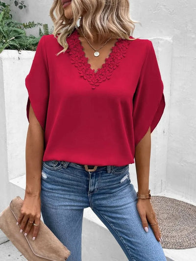 Lace Detail V-Neck Half Sleeve Blouse in red worn with jeans, showcasing lace detailing and a stylish design.