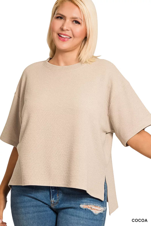 Zenana Full Size Double Knit Side Slits Hi Low Short Sleeve Top Plus Size in cocoa color on a smiling model.