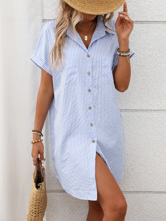 Model wearing a Striped Button Down Short Sleeve Mini Dress with a straw hat, showcasing button details and a relaxed fit.