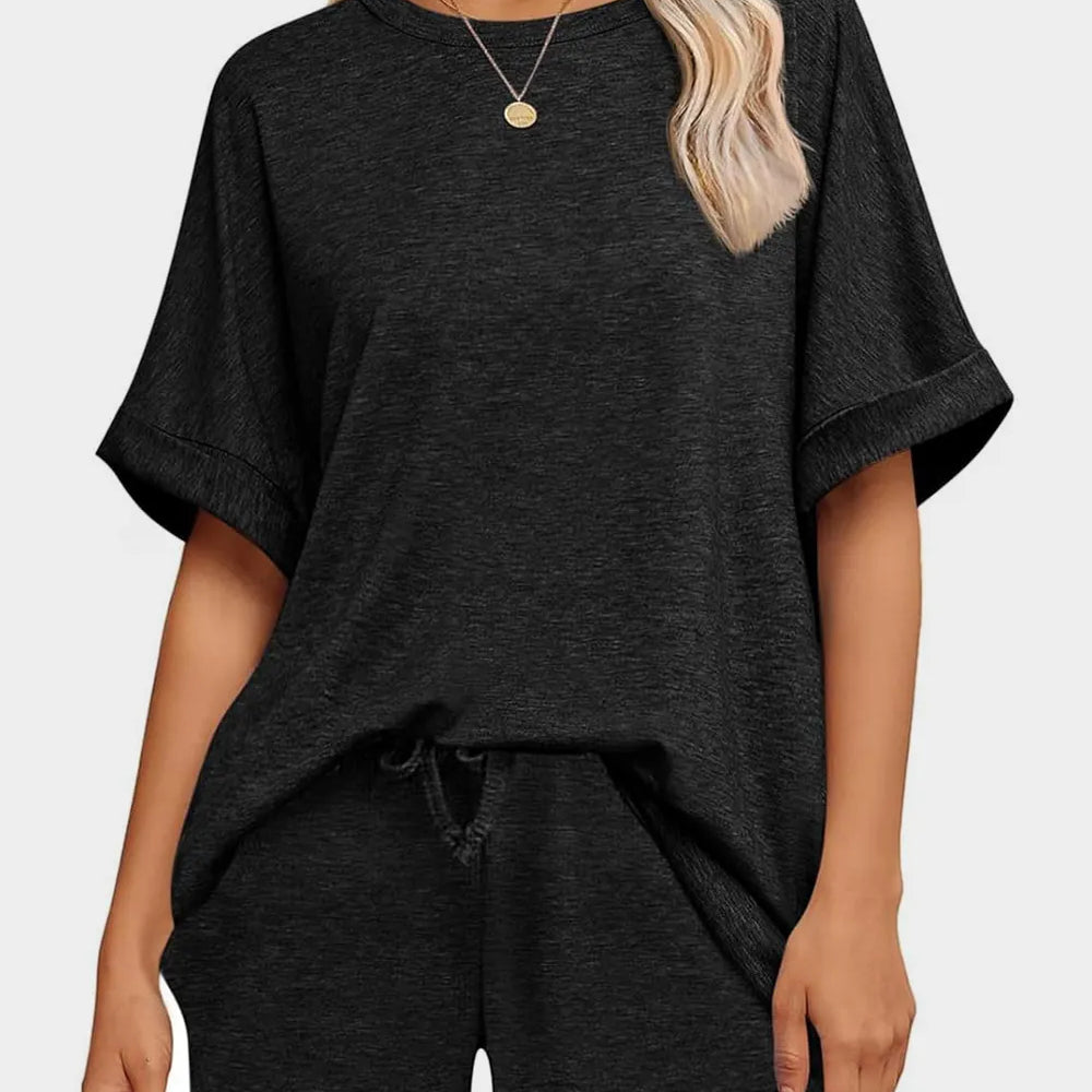 Round Neck T-Shirt and Drawstring Shorts Set in black with loose fit and casual style.