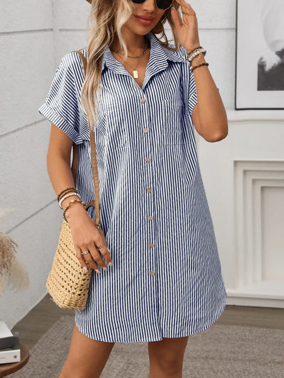 Striped Button Down Short Sleeve Mini Dress on a model wearing it with a casual bag in a modern setting.