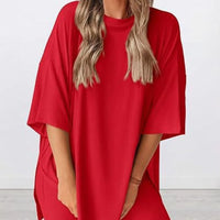 Full Size Oversized Slit Round Neck Top and Shorts Lounge Set Plus Size in vibrant red color worn by a smiling model.